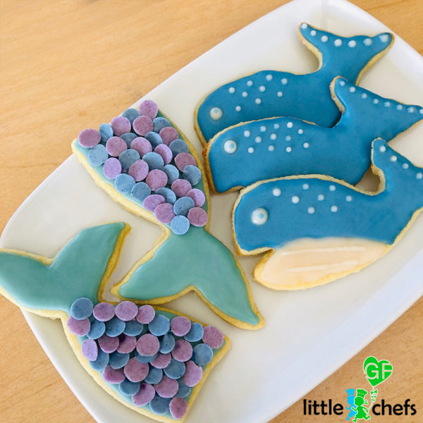 mermaid and whale cookies on a plate